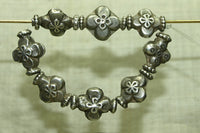Strand of Antique silver floral beads from India