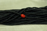 Black Tamba with coral-glass melon beads