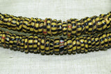 Strand of Yellow with Black Stripes Eja (Aja) Beads