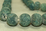 Strand of Rare small Mottled dark Teal Majapahit Beads