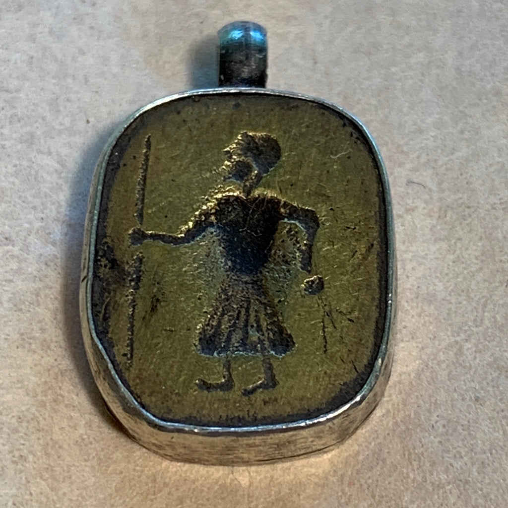 Brass Figural Pendant Set in Sterling Silver