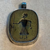 Brass Figural Pendant Set in Sterling Silver