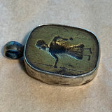 Brass Figural Pendant Set in Sterling Silver