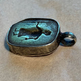 Brass Figural Pendant Set in Sterling Silver