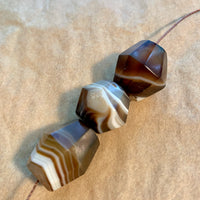 Three Antique Idar-Oberstein Banded Agate Beads