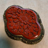 Carved Cinnabar Dress Clip