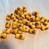 Antique 1930s Yellow Glass Venetian Bead with Swirly Eyes