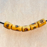 Antique 1930s Yellow Glass Venetian Bead with Swirly Eyes