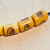 Antique 1930s Yellow Glass Venetian Bead with Swirly Eyes