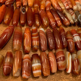 Pair of Striated Carnelian Beads