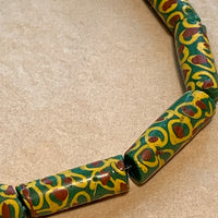 Antique Green With Red & Yellow Eyes Trade Beads