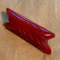 Carved Red Bakelite Pin
