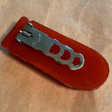 Carved Red Bakelite Clip