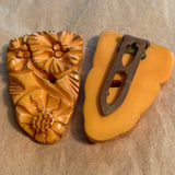 Carved Yellow Bakelite Shoe Clips
