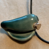 Ceramic Shell Pendant, Vessel