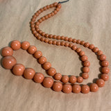 Coral Color Bakelite Beads
