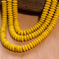 Opaque Yellow Pressed Glass Discs