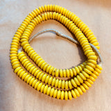 Opaque Yellow Pressed Glass Discs