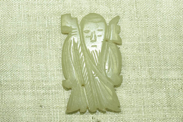 Antique Chinese Carved Jade pendant of Jurojin