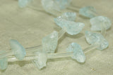 Strand of Elongated Aquamarine chip beads