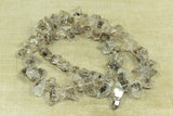 Strand of heavily "Termilated" Quartz rough cut beads