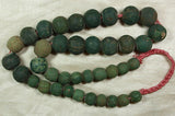 Impressive strand of Chartreuse and Teal Majapahit beads