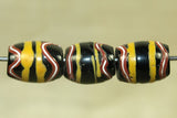 Black and Yellow Stripe Venetian Bead with White and red squiggles