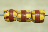 Yellow Venetian glass Bead with stripes