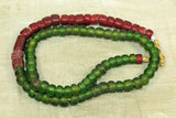 Strand of Antique White Hearts and Translucent green beads