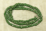 Strand of Green and White Striped Beads