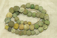 Strand of Very Worn Chartreuse Majapahit Beads