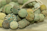 Strand of Very Worn Chartreuse Majapahit Beads