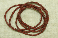 Tiny Ancient Brick Red Tradewind Beads