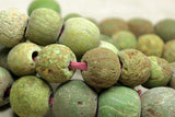 Strand of Small Chartreuse Majapahit Beads