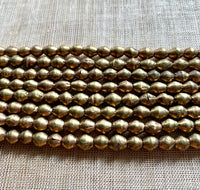 New 5 x 7mm Ethiopian Brass Bicones