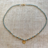Sapphire & 18 Karat Shiva Necklace