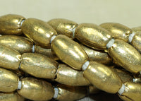 Strand Ethiopian Brass Tapered Football Beads