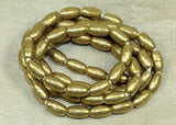 Strand Ethiopian Brass Tapered Football Beads