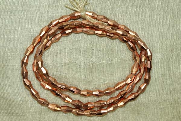 Shiny faceted Copper Bicone Beads from India