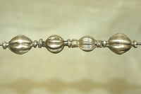 Set of four Antique Fluted Silver Beads