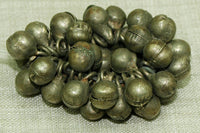 Strand of Small Brassy Silver Bells from Nigeria
