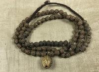 Strand of Yoruba Brass Fabricated Beads with Pendant