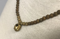 Strand of Yoruba Brass Fabricated Beads with Pendant