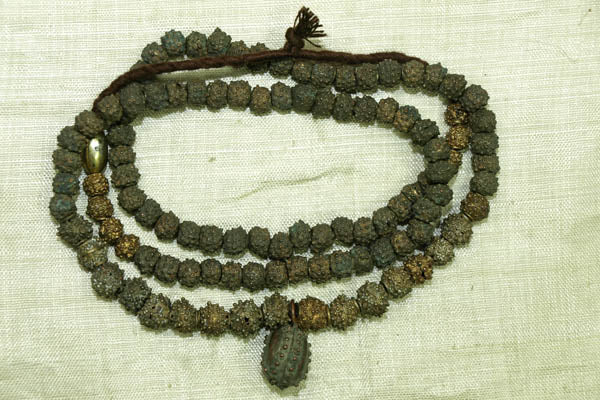 Strand of Yoruba Dark Brass Fabricated Beads