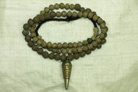 Strand of Yoruba Brass Fabricated Beads and Pendant