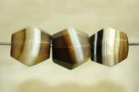 Three antique Idar-Oberstein Banded Agate Beads