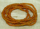 Transparent "Dirty" Orange Seed Beads, 10º