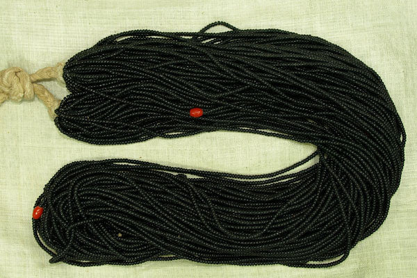 Black Tamba with coral-glass melon beads