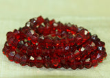 Vintage Czech Ruby Glass Tin-Cut Bicone Beads
