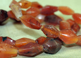 Strand of Hand-Carved Carnelian Beads from the Lou Zeldis Collection